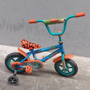 Bicicleta infantil Veloci r12 azul jurassic reacondicionado
