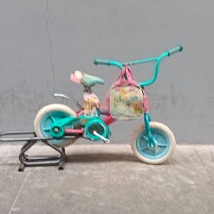 Bicicleta Veloci r12 rosa cinderella reacondicionado