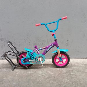 Bicicleta Veloci  r12 morado power girl reacondicionado